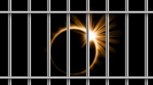 eclipse behind prison bars