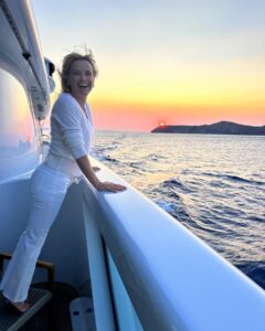 Reese Witherspoon shared new photos of herself enjoying a sunset boat ride while sporting an all-white outfit
