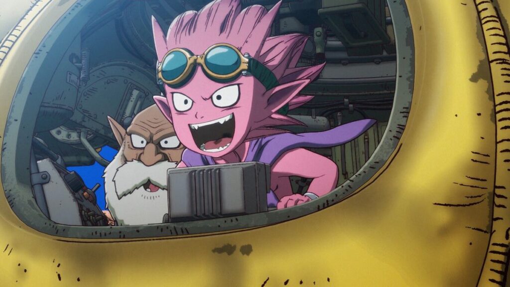 A pink anime boy wearing goggles and an old man with a white beard stare excitedly out of the porthole of a yellow tank.