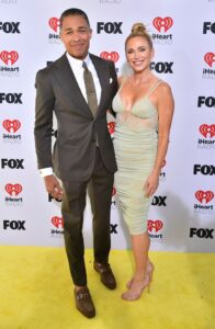 T.J. Holmes, left, and Amy Robach are photographed at the iHeartRadio Music Awards on April 1, 2024, in Los Angeles.