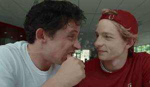 Mike Faist and Josh O'Connor' share a churro in a scene from 'Challengers'