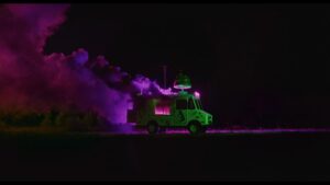 Purple smoke rises out of an ice cream truck in I Saw the TV Glow