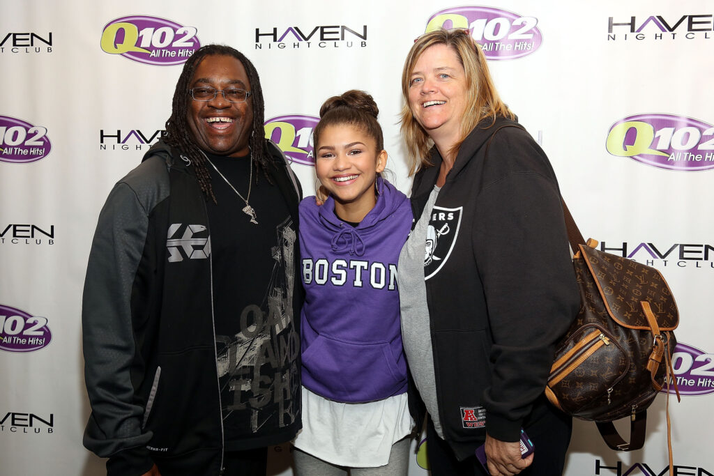 Zendaya with her parents, Kazembe Ajamu Coleman and Claire Stoermer, at the Q012 Performance Theater in Bala Cynwyd, Pennsylvania, on October 17, 2013