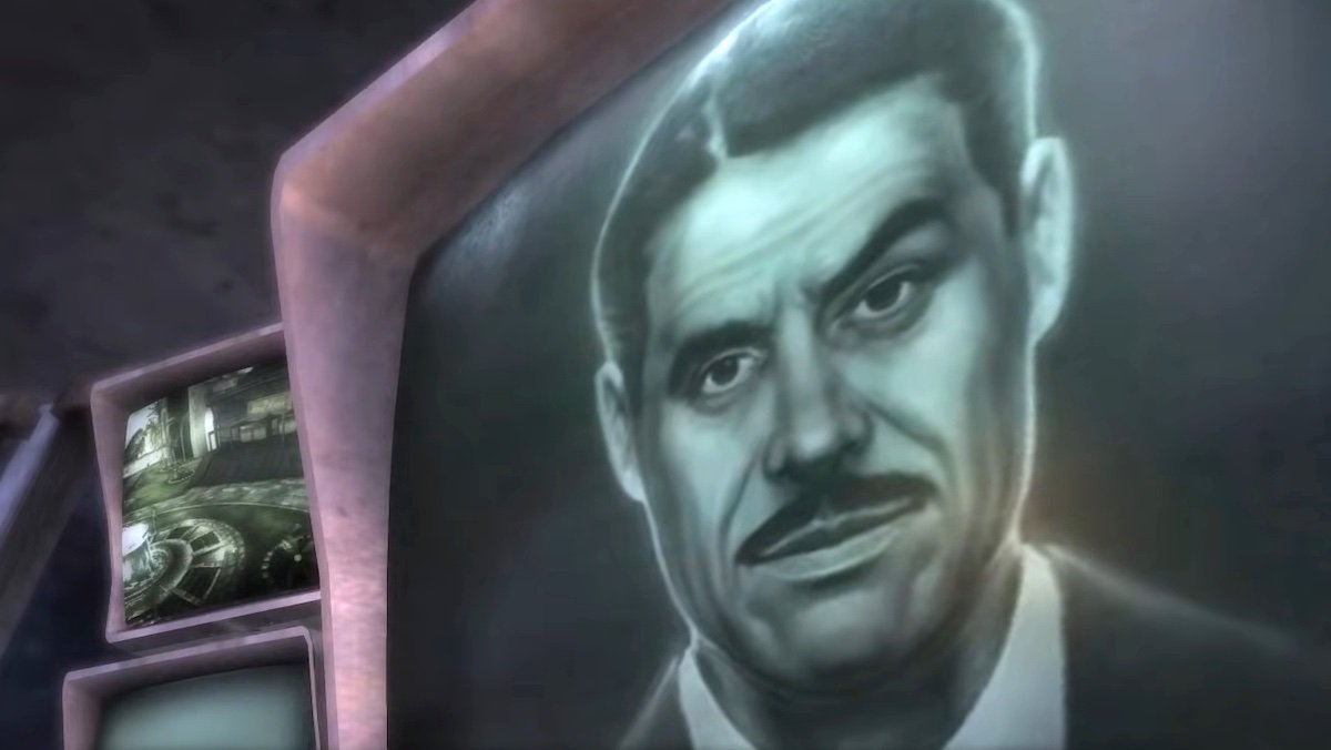 Animated image of a mustachioed Mr. House in a black suit and tie on a computer screen in Fallout: New Vegas