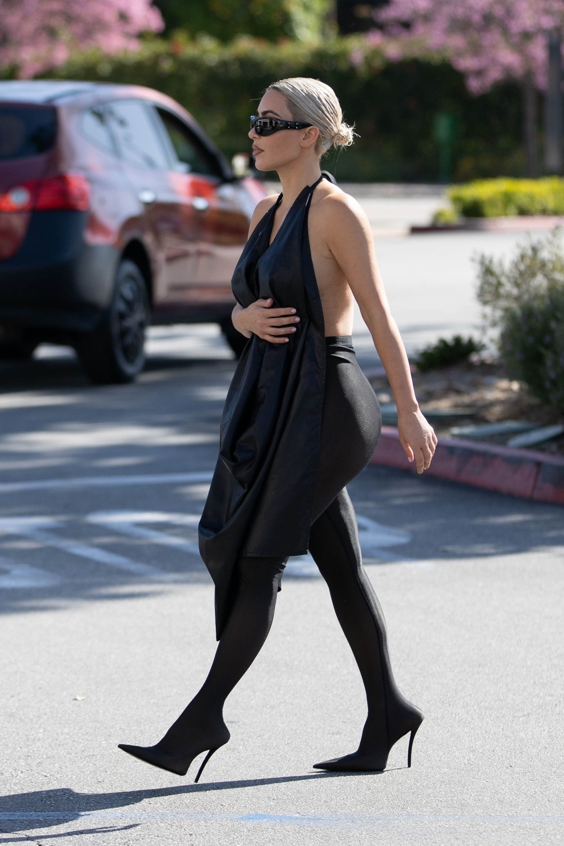 Kim was spotted wearing an all-black outfit with a short platinum-blonde haircut
