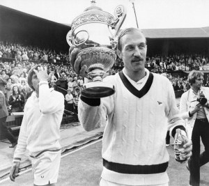 Stan Smith holds the trophy after winning Wimbledon in 1972