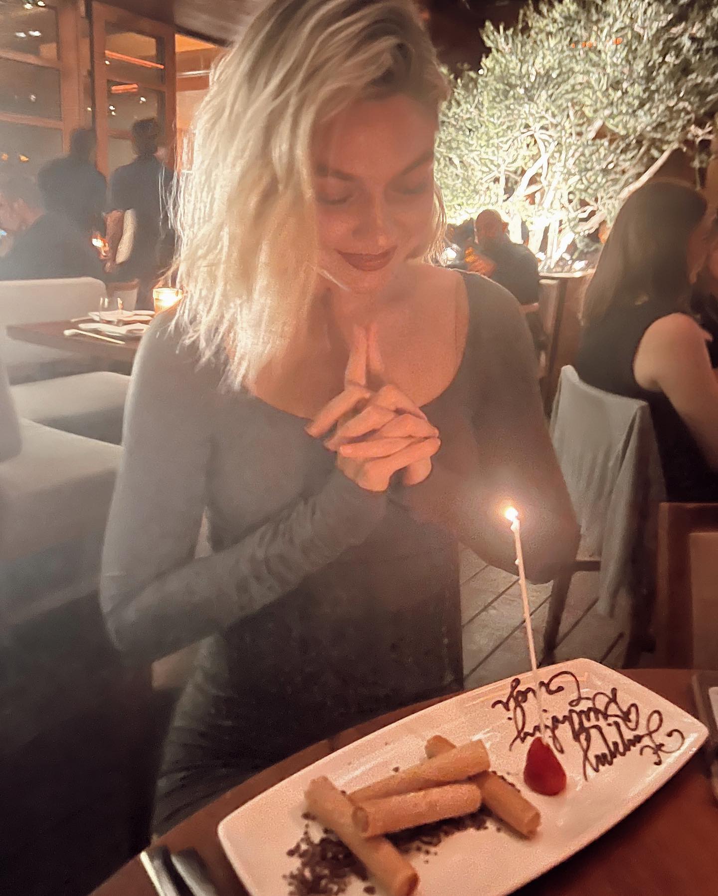 The last photo captured Gigi wearing a skintight outfit at her birthday dinner