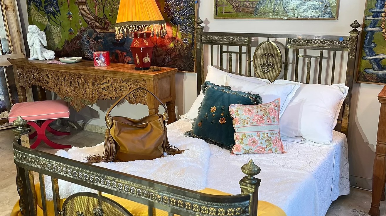 A stunning metallic bed is one of the items up for sale