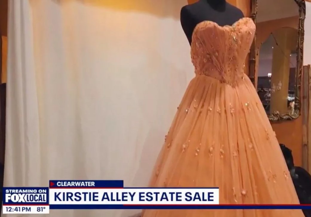 An orange embellished ball gown Kirstie wore on Dancing With The Stars is also available
