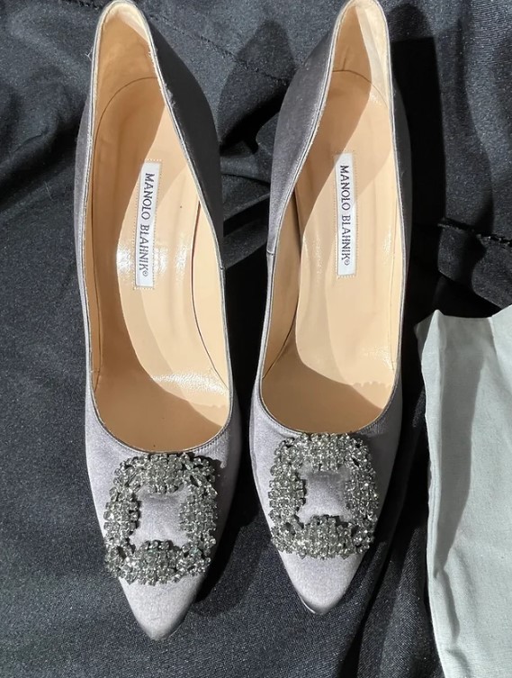 There are 400 pairs of shoes, including these embellished ones by Manolo Blahnik