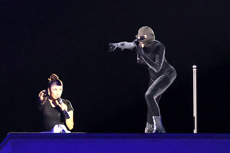 Madonna rehearses on stage at Copacabana beach.