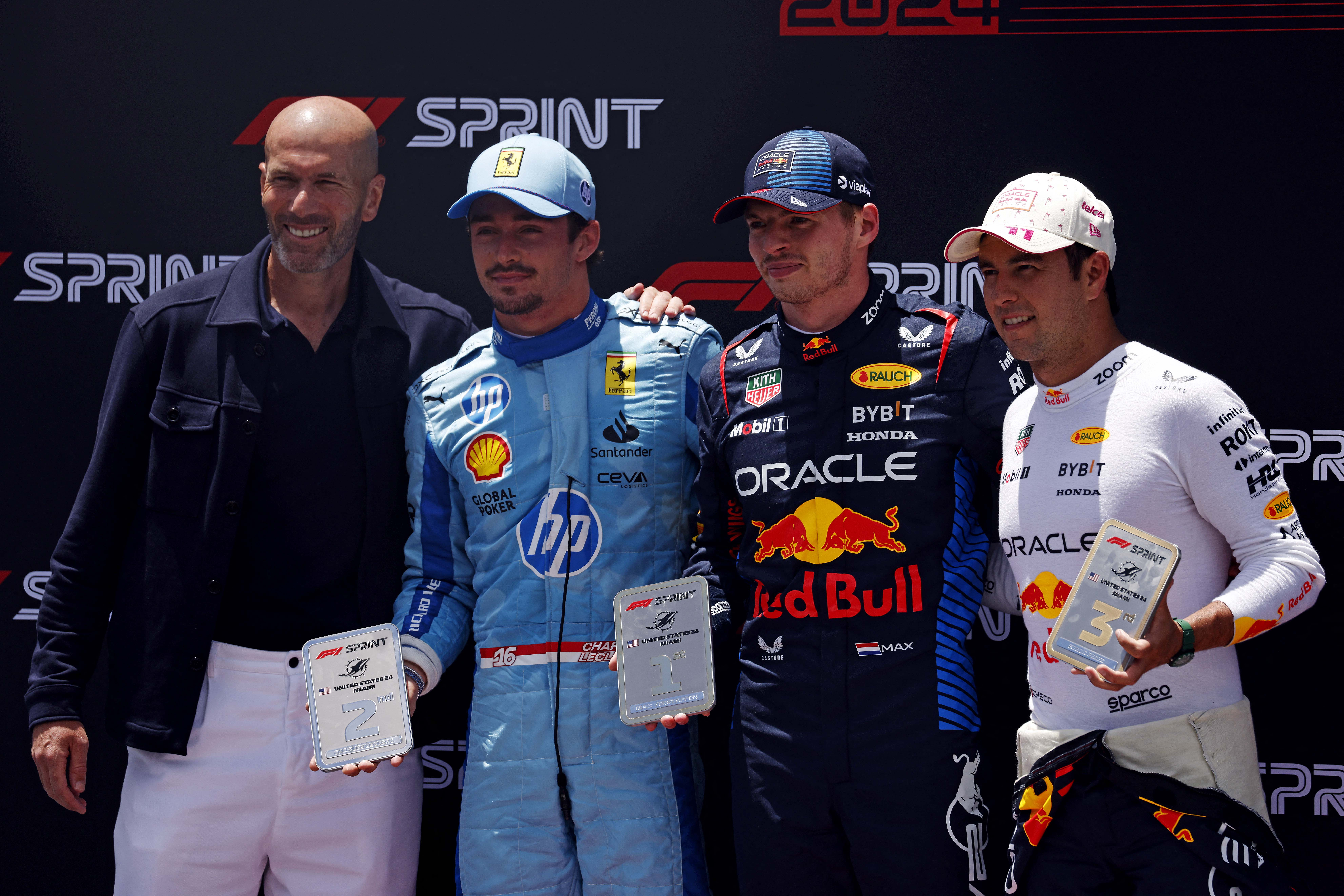 Footy legend Zinedine Zidane poses with Charles Leclerc, Max Verstappen and Sergio Perez