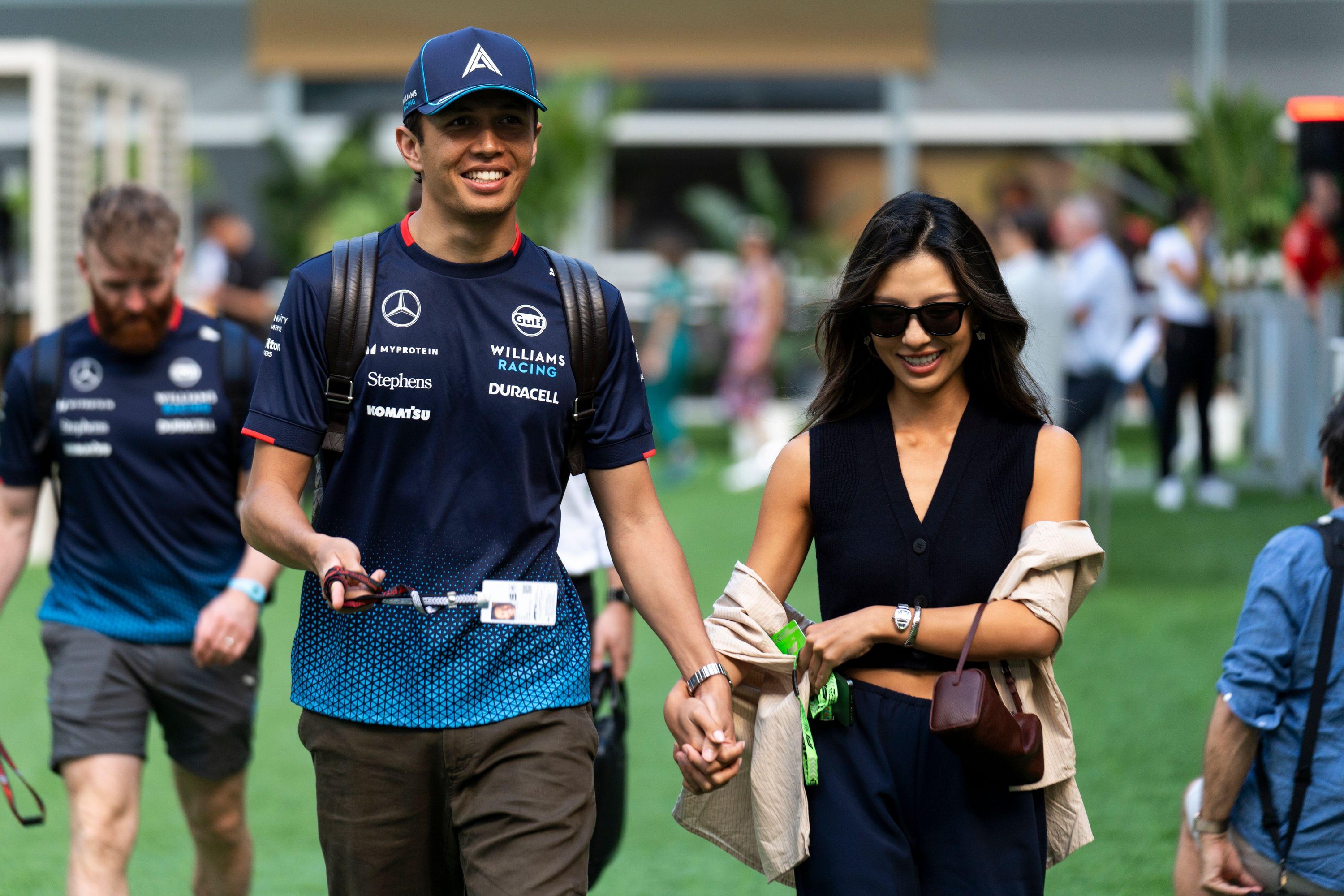 F1 star Alex Albon and Lily Muni looked very much in love as they arrived together