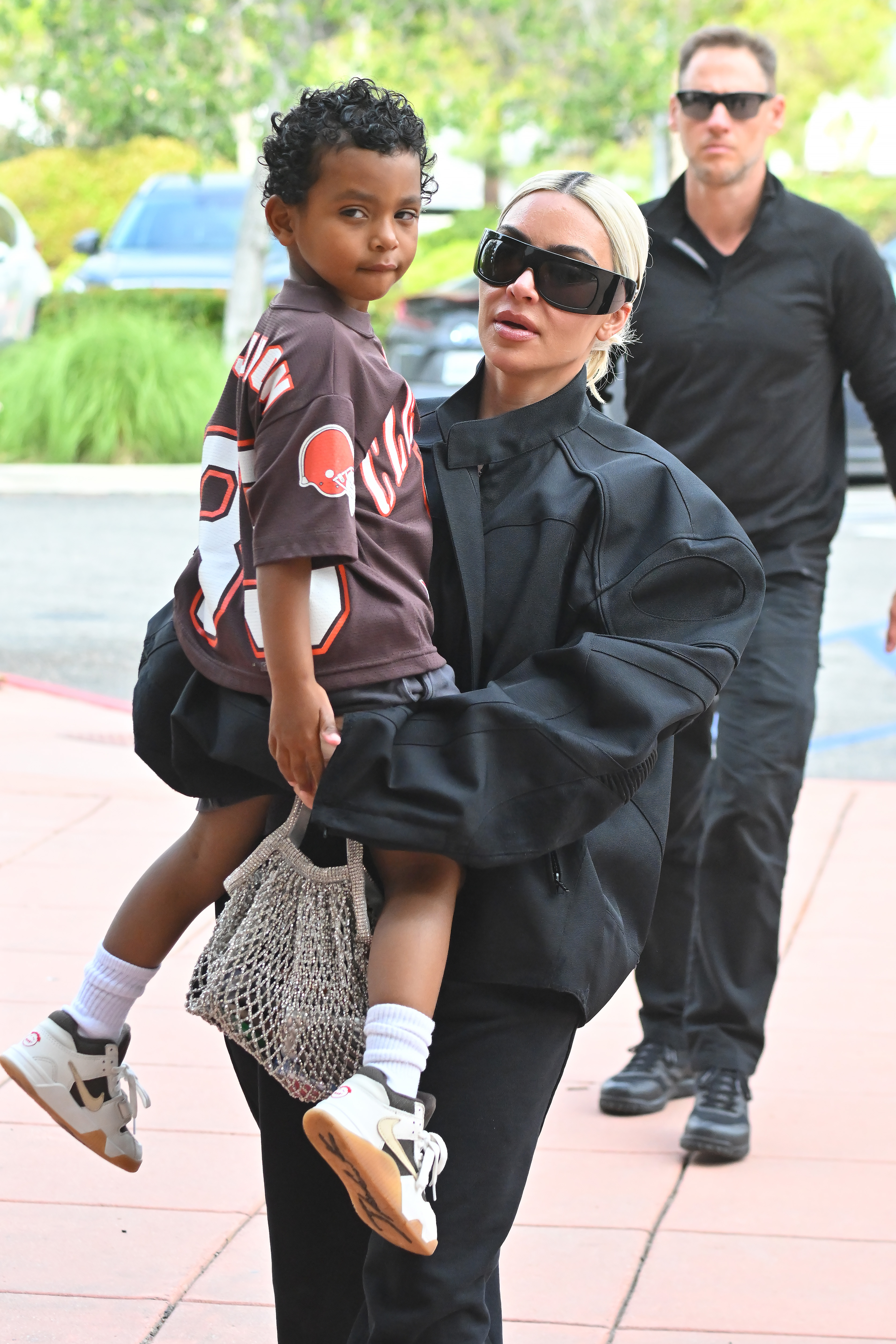 The recent photos were from Friday when her son Psalm and her attended her oldest son, Saint's, basketball game