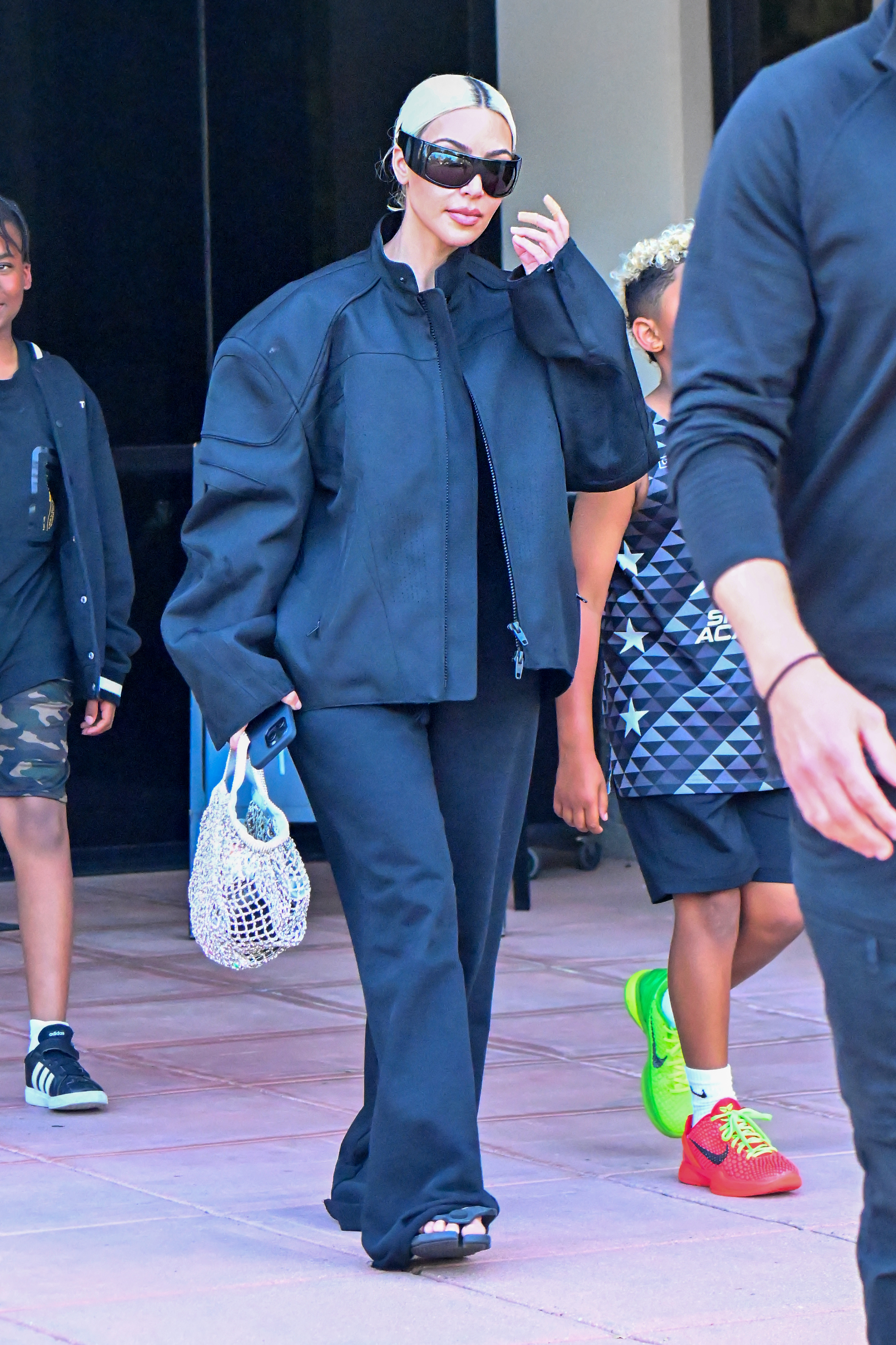Kim was seen out in an oversized jacket and pants in California
