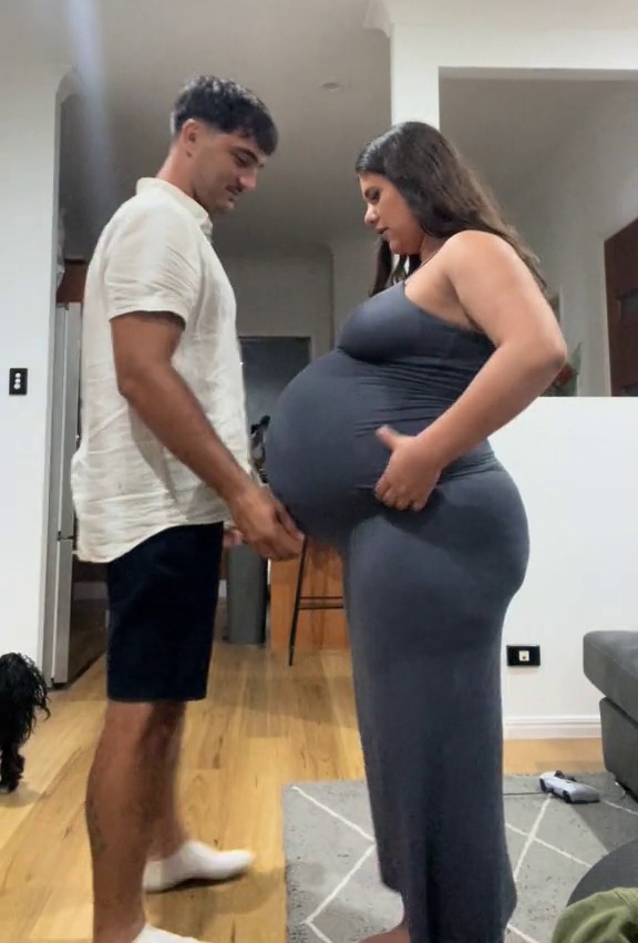 The mum-to-be posed with her partner and showed off just how big her bump had gotten