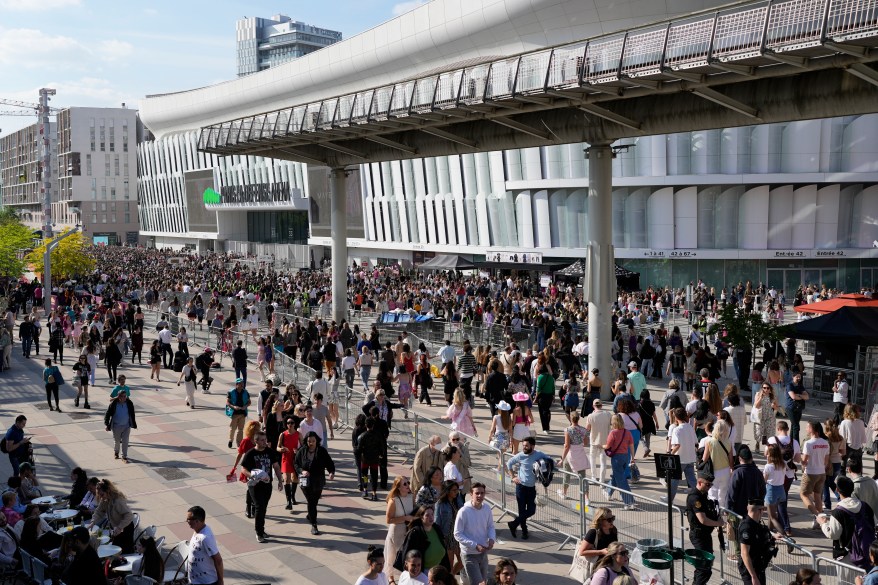 Fans arrive at Paris La Defense Arena.