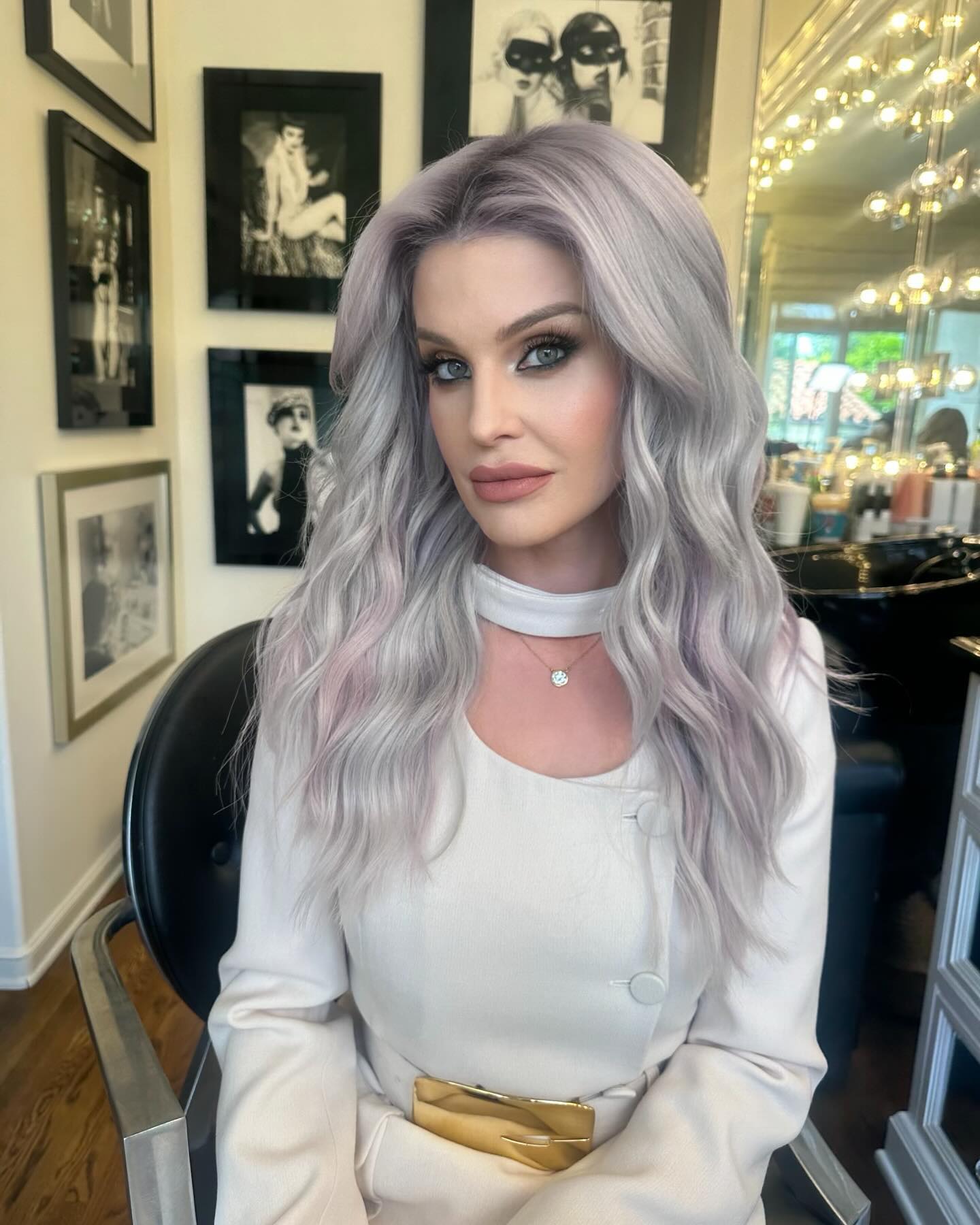Kelly added a blond tint to her purple-gray locks