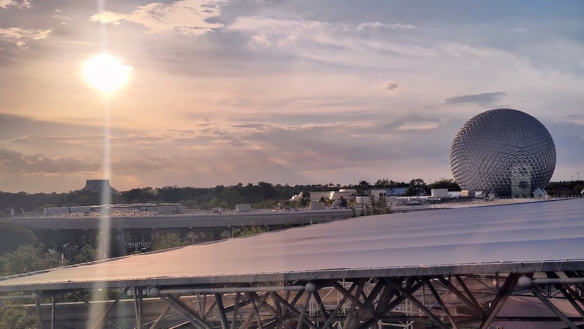 The sun setting near Spaceship Earth at EPCOT