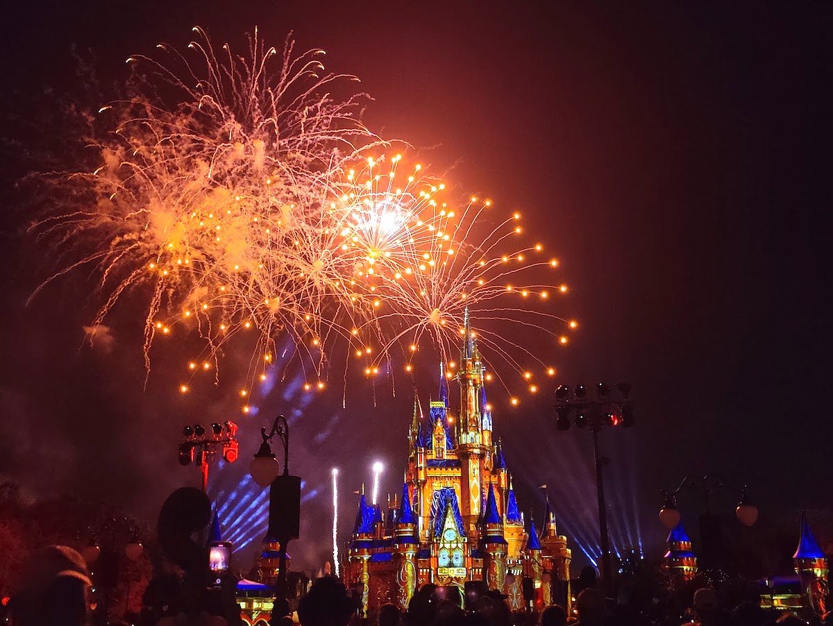 Fireworks fill the night sky over Cinderella's Castle at the Magic Kingdom