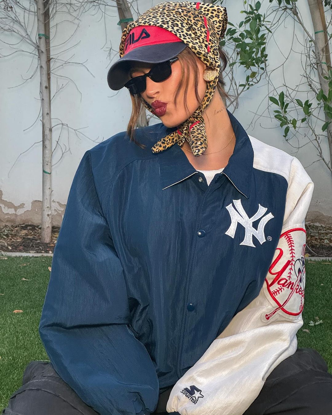 Hailey bundled up in a baggy jacket at Coachella