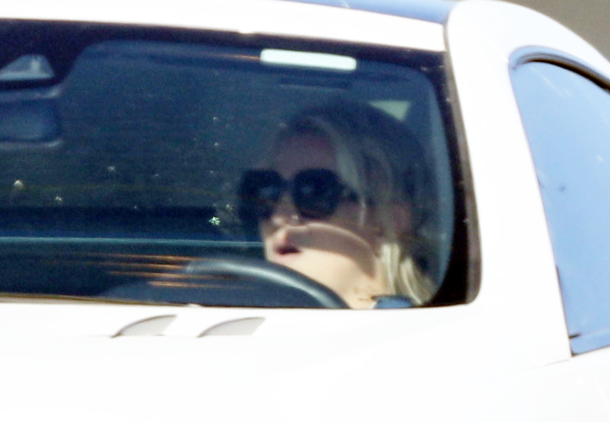 Britney covered her eyes with huge black sunglasses