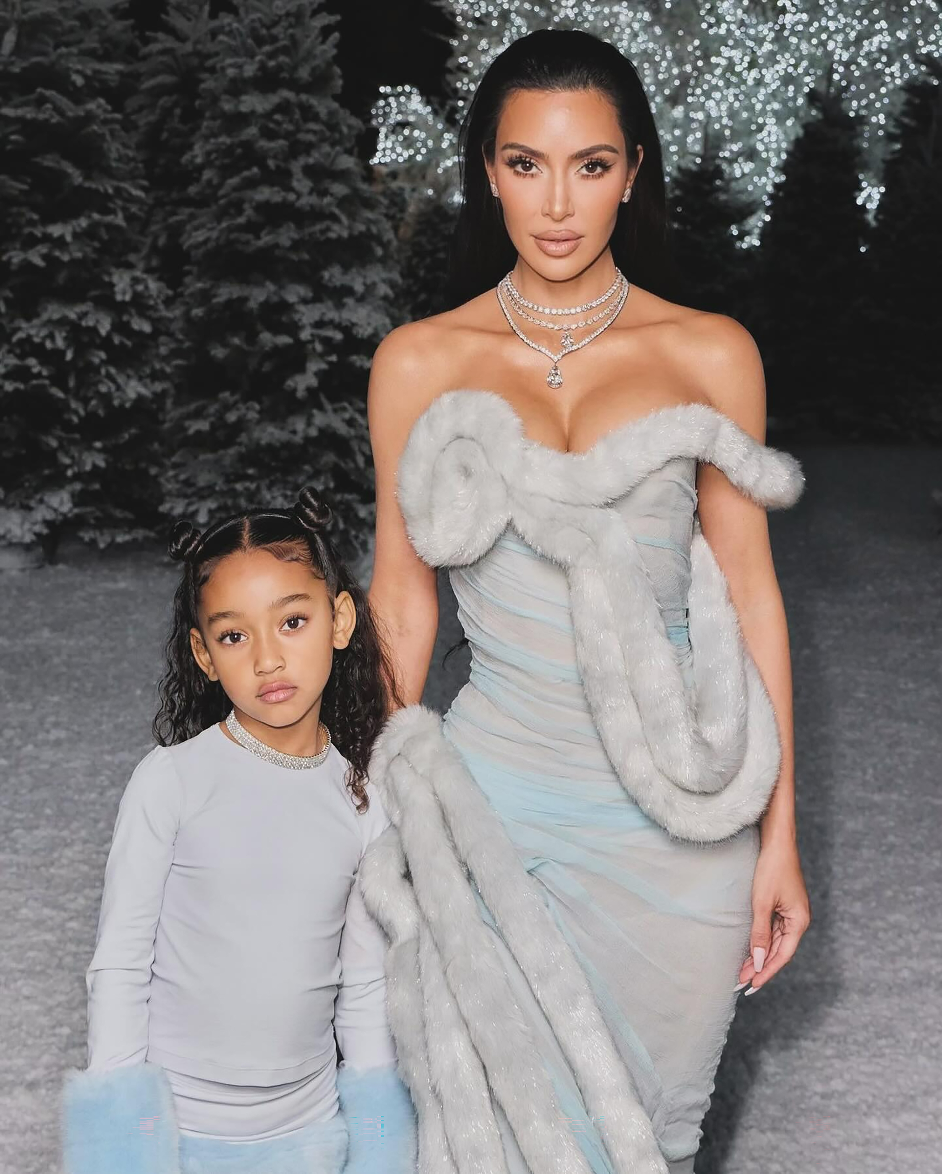 Kim Kardashian and copycat daughter Chicago West at the family's annual Christmas Eve party in 2023