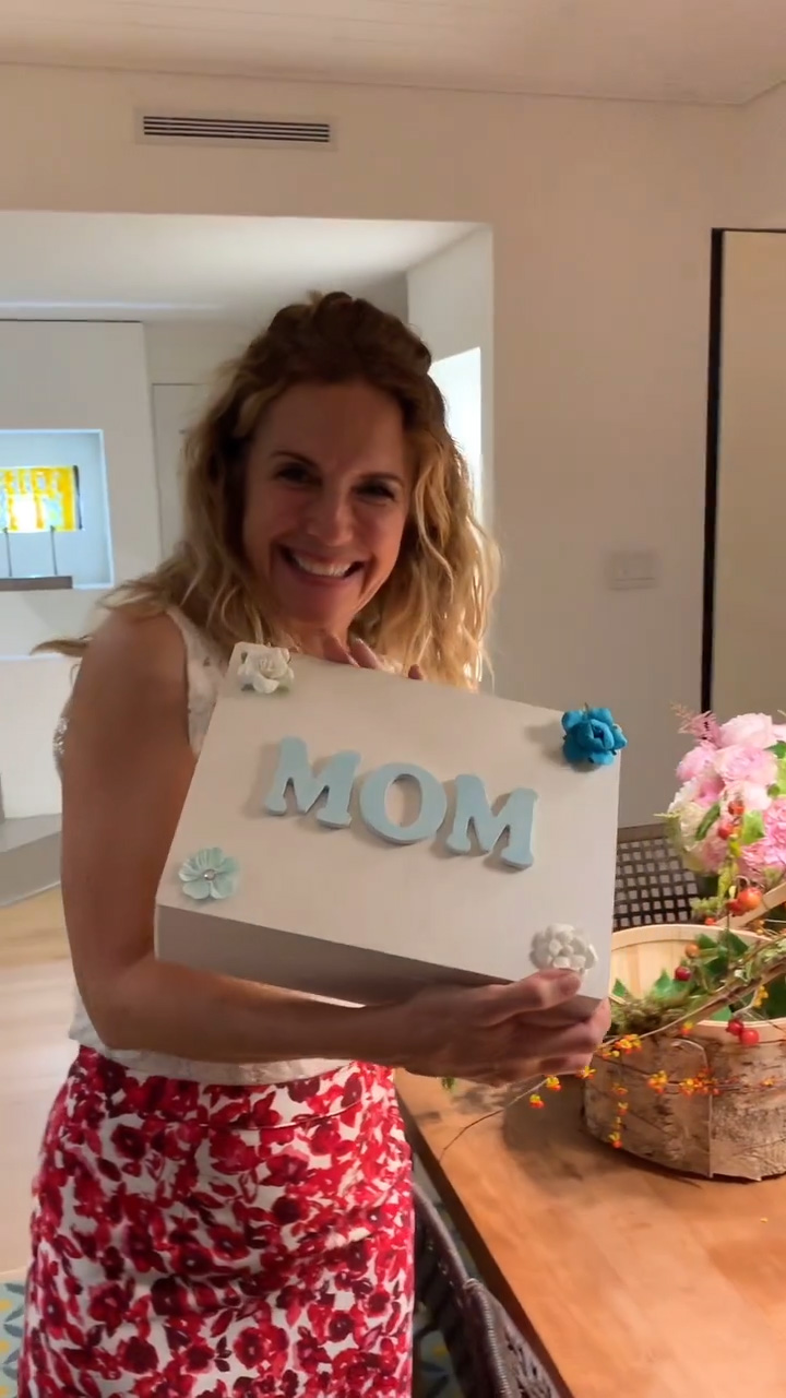 John shared another tribute to his late wife on Mother's Day last year that showed her opening a keepsake box made by her kids