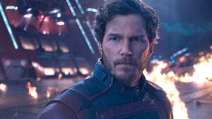 Star-Lord looks sterns as explosions go off behind him in Guardians of the Galaxy Vol. 3