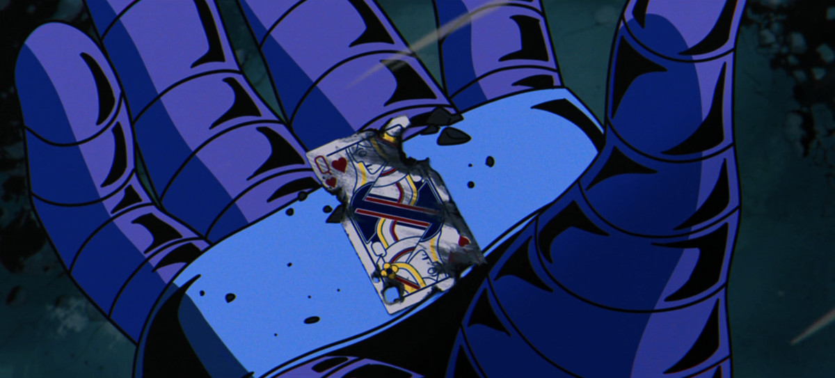 Apocalypse’s hand, with one of Gambit’s burnt playing cards — the queen of hearts — nestled in it. 