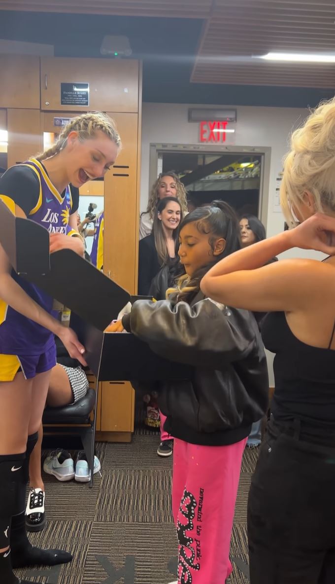 Kim and North met with the LA Sparks backstage at the WNBA basketball game