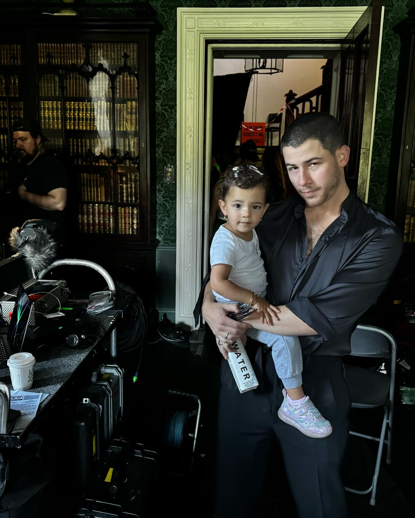 Nick Jonas showed off his new haircut while carrying his daughter Malti