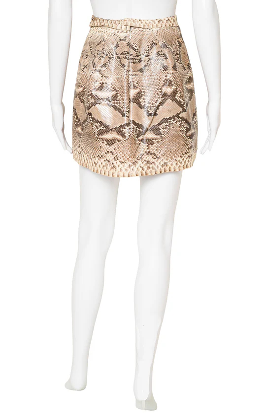 Kim is also selling a snakeskin Dolce & Gabanna skirt from her personal collection