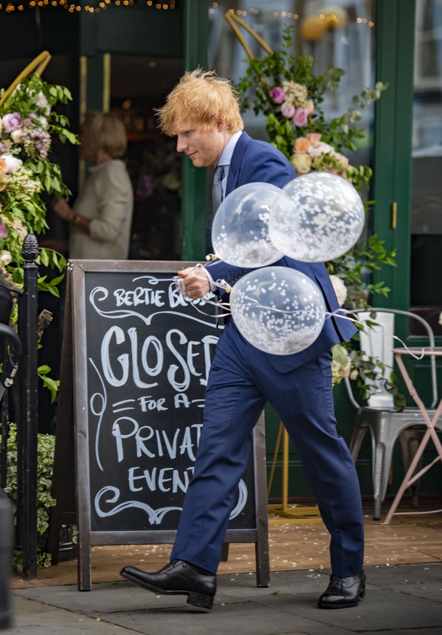 Doting dad Ed was on hand with the balloons