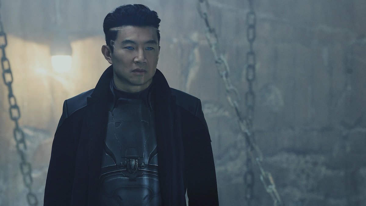 Simu Liu in black clothes and a futuristic haircut in Atlas