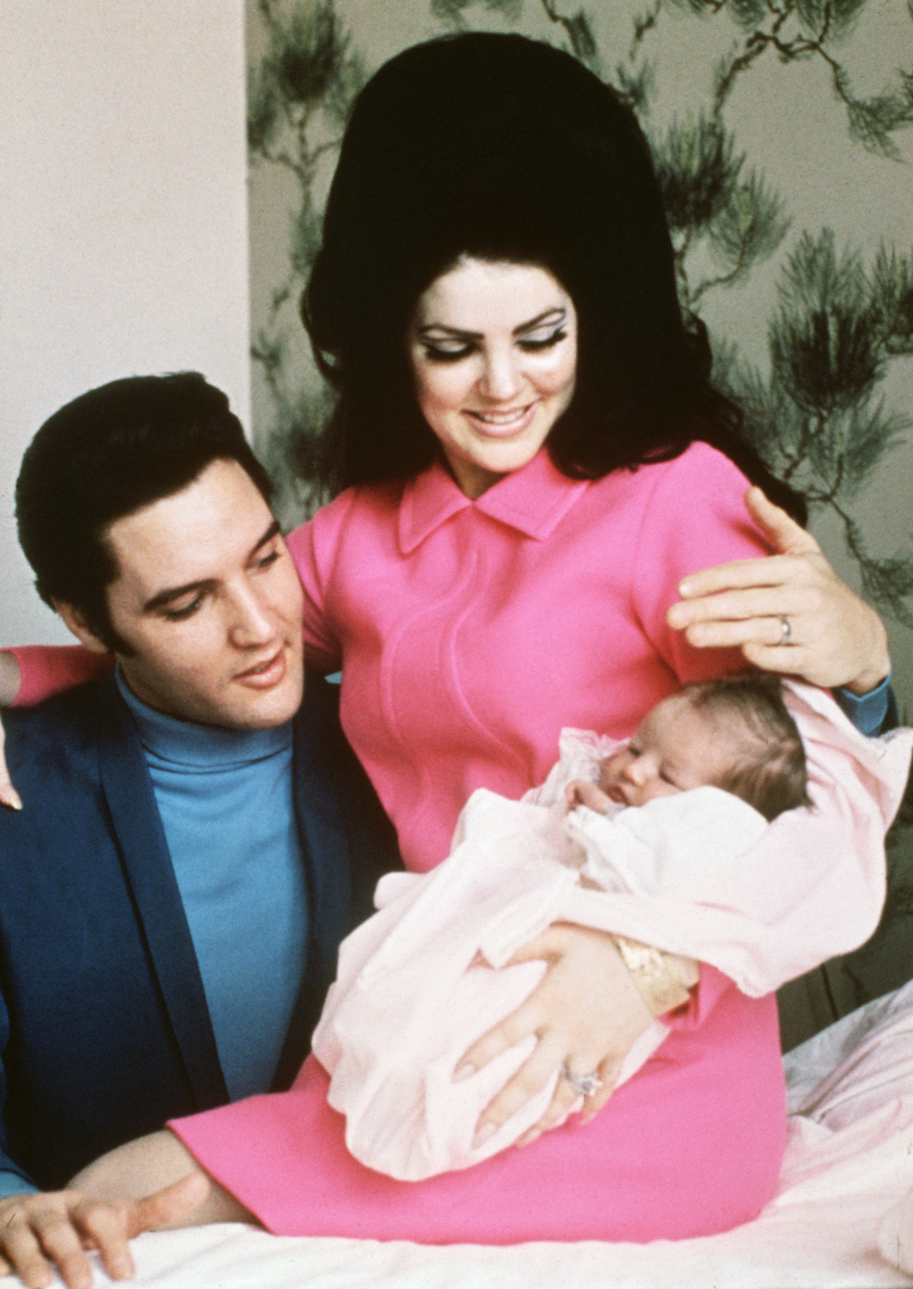 Elvis Presley pictured with his wife Priscilla as they prepared to leave hospital with their daughter, Lisa Marie in 1968.