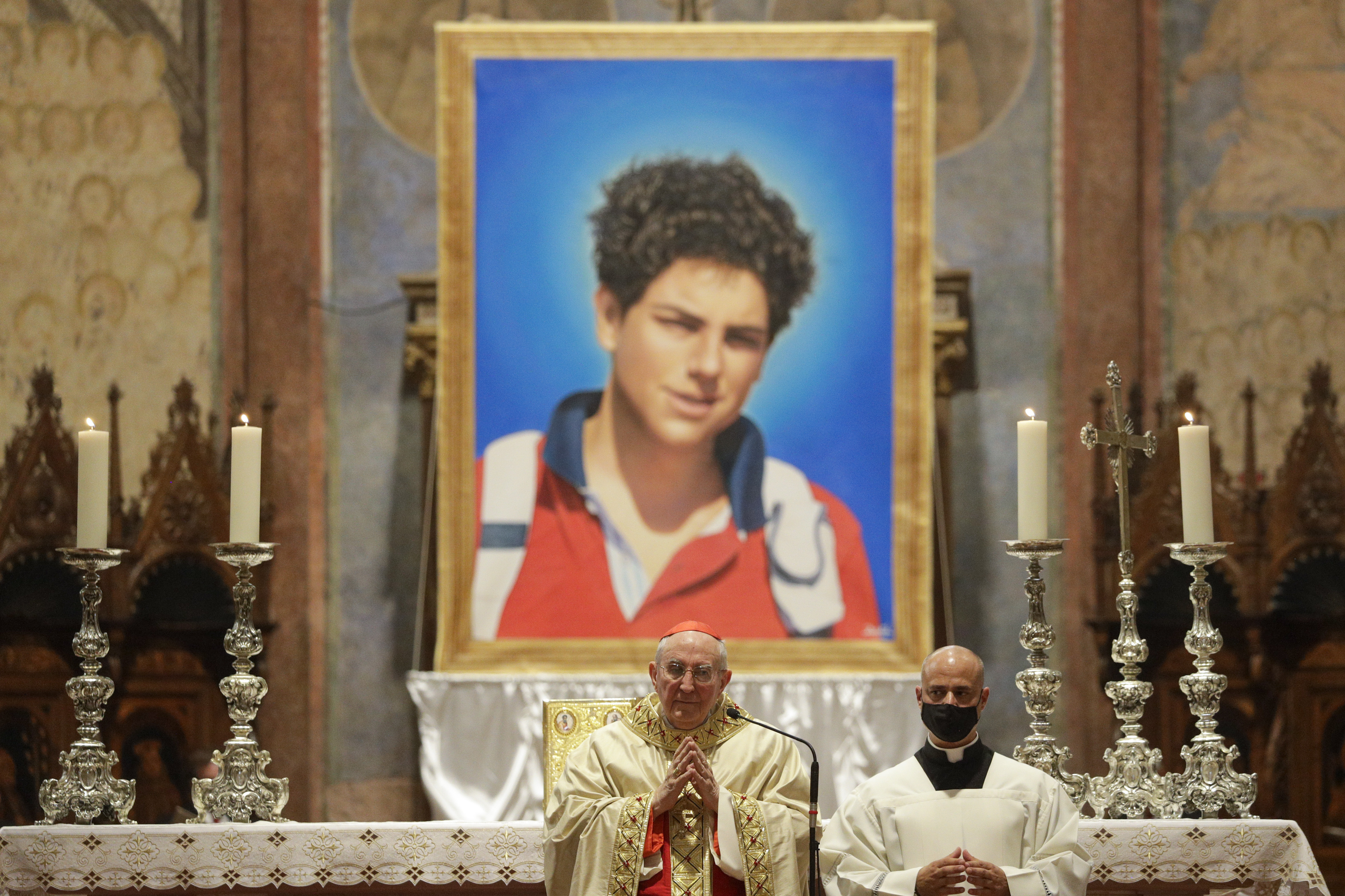 Carlo’s photo on display at a beatification ceremony in Assisi in 2020