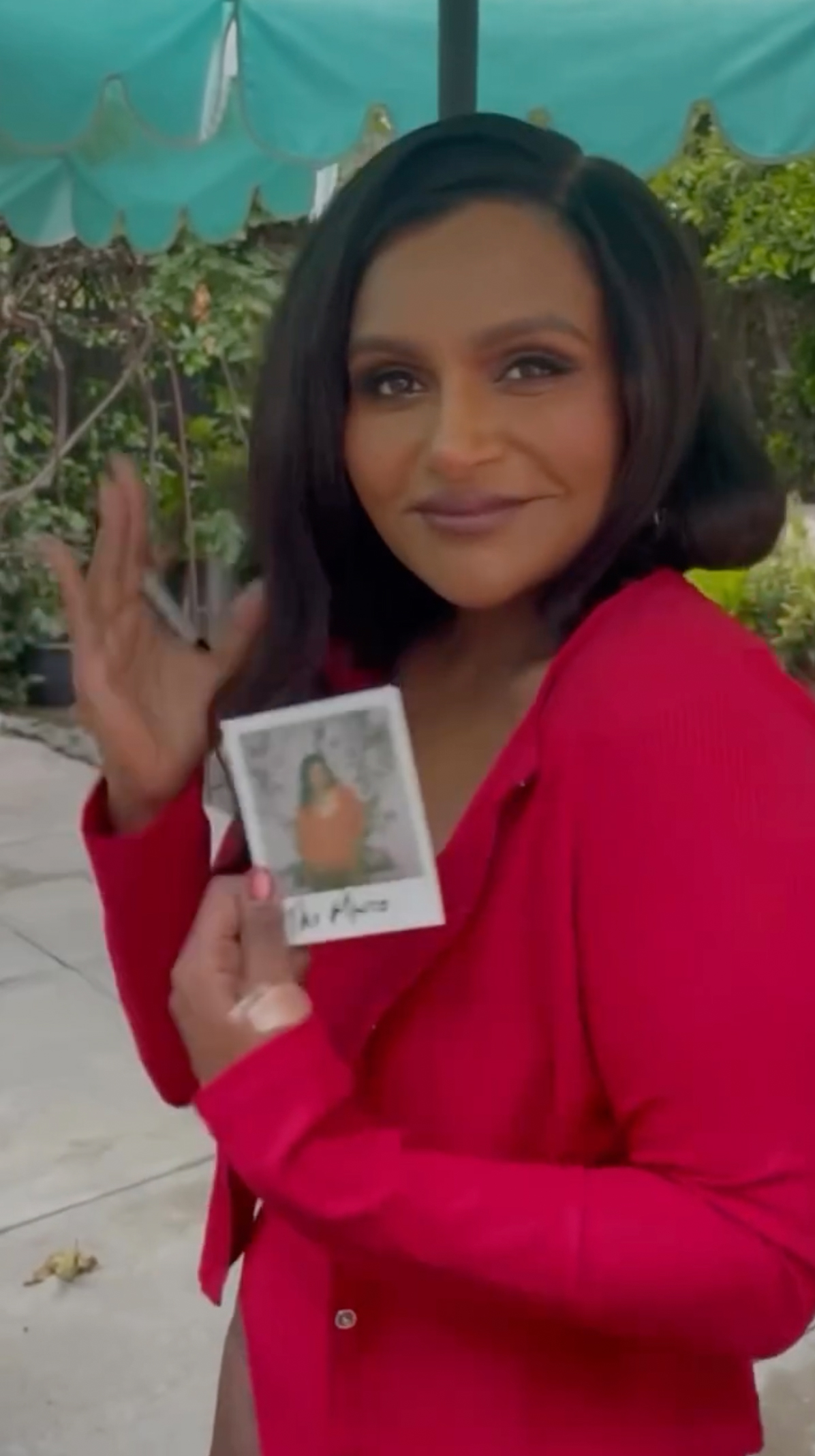 Mindy shared a Polaroid of herself wearing an Andie one-piece in her Instagram reel
