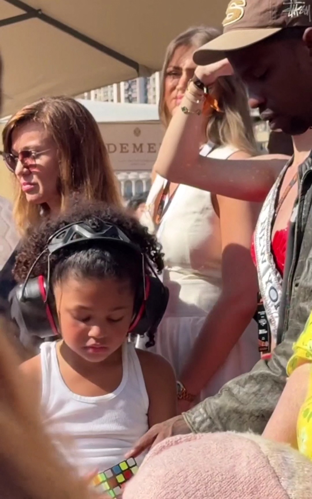 Stormi played with a Rubix cube during the race