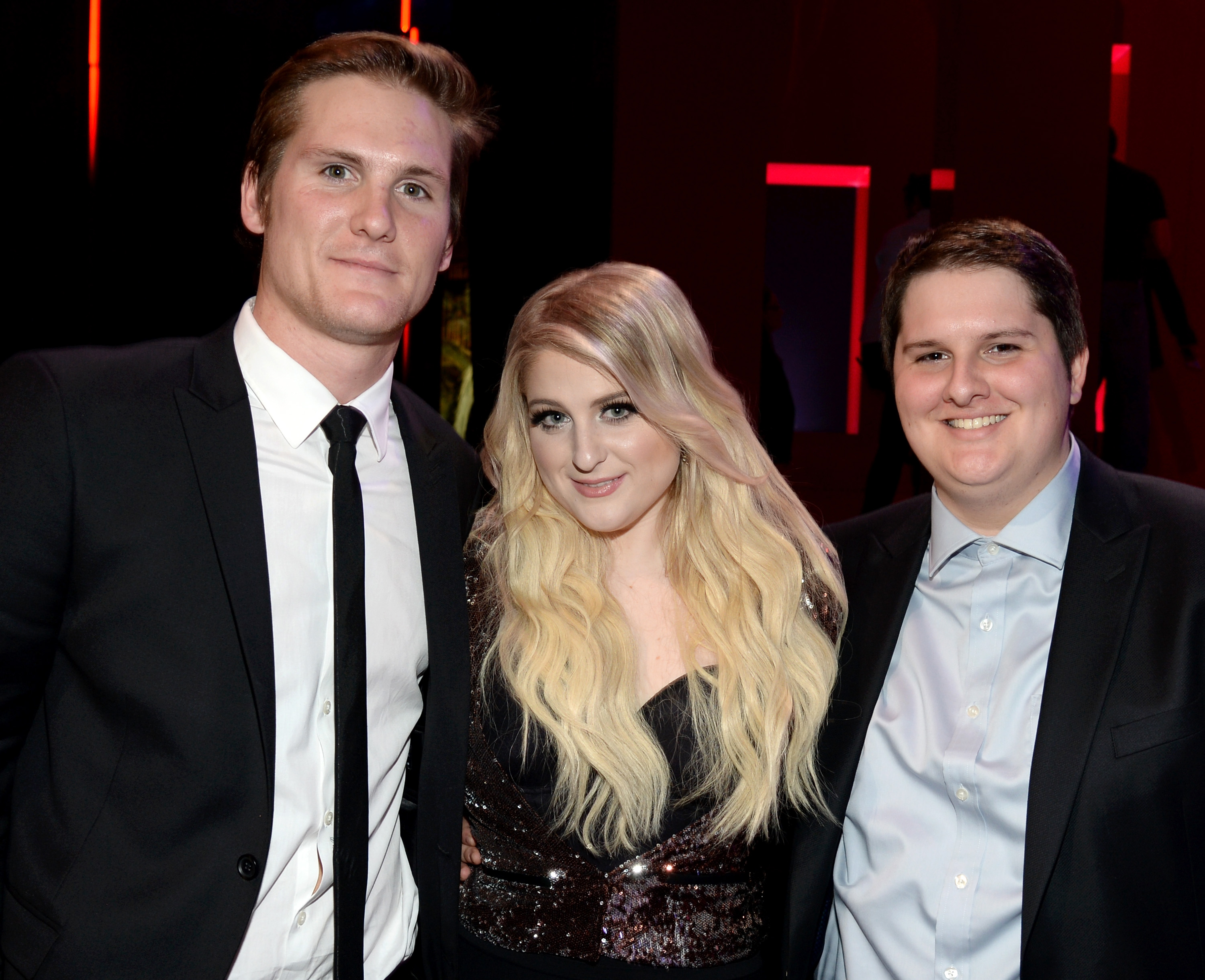 Ryan Trainor, Meghan Trainor, and Justin Trainor attend the iHeartRadio Music Awards at The Shrine Auditorium on March 29, 2015, in Los Angeles, California