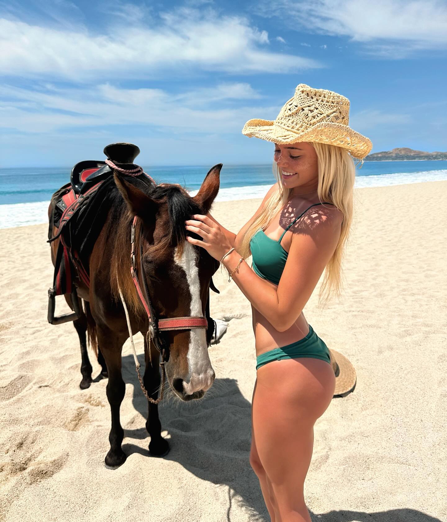 The LSU gymnast went horse riding in a beach near Los Cabos