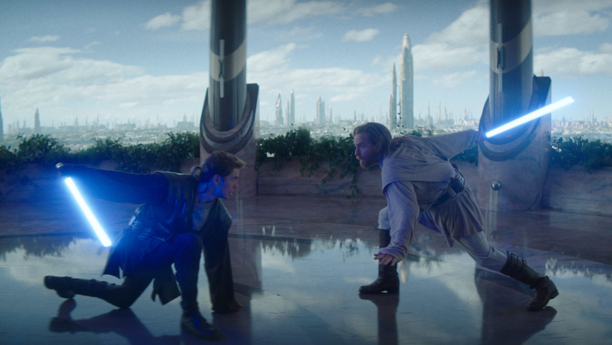 Anakin and Obi-Wan engaged in a lightsaber duel in a star wars flashback