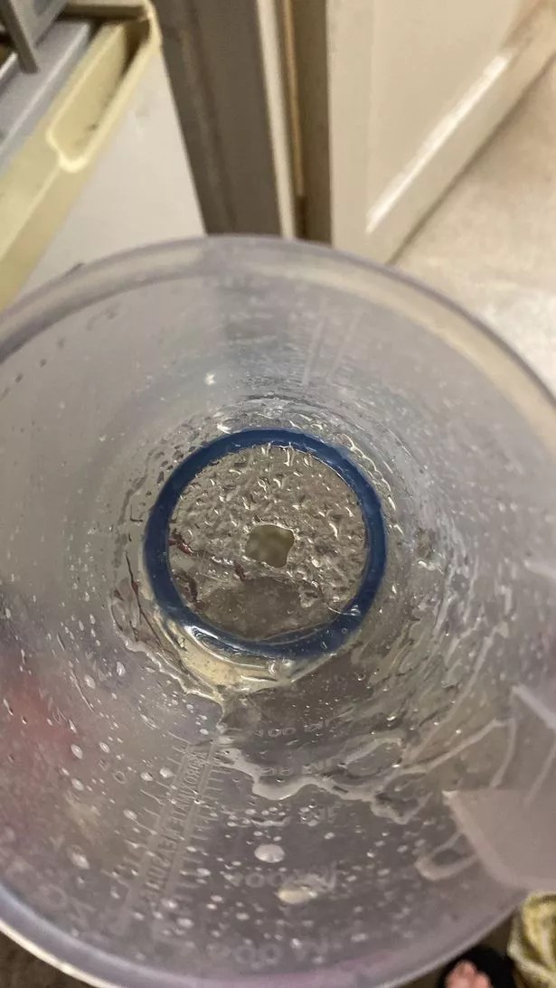 The plastic container with the sugar and water melted in the microwave