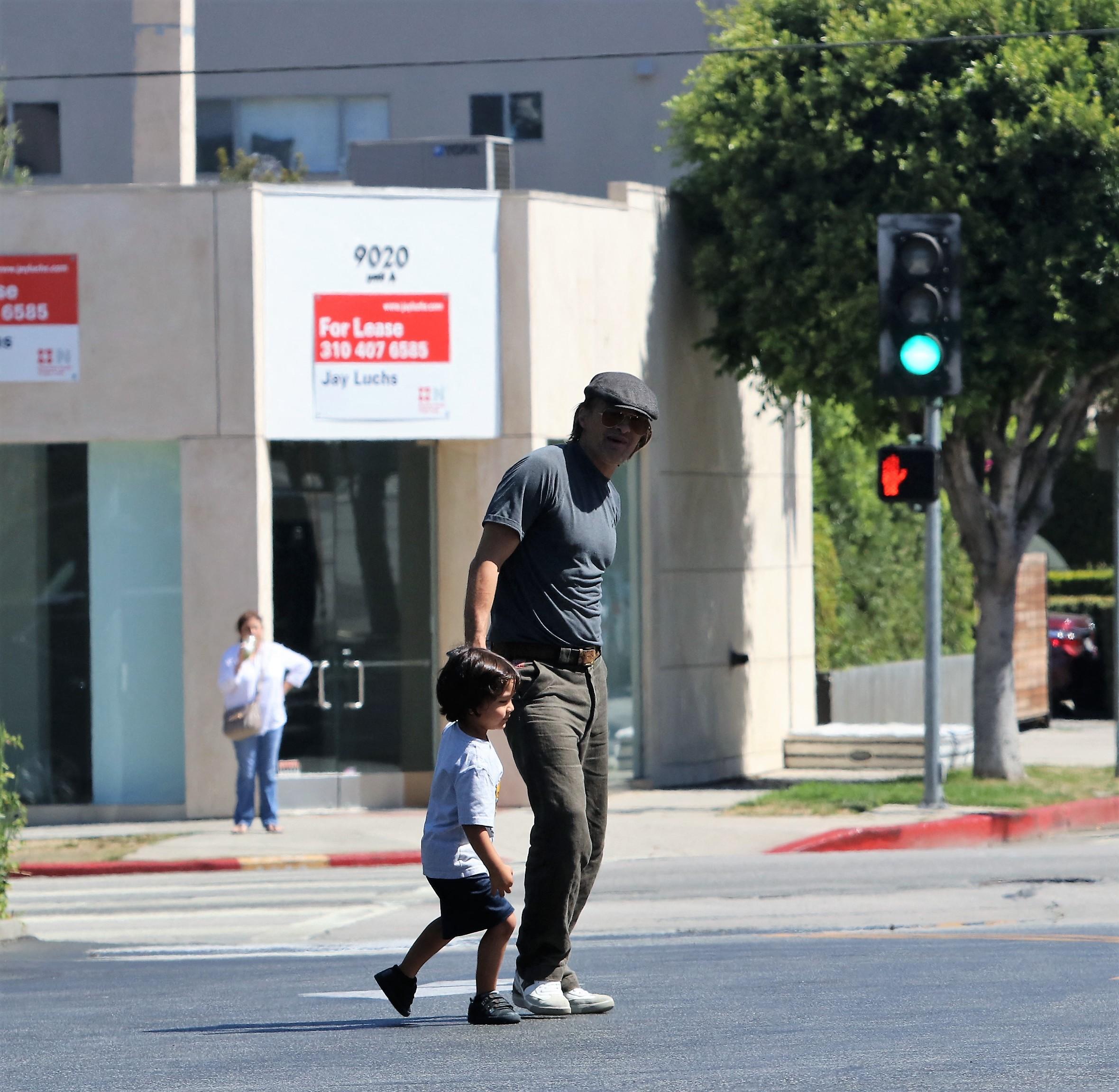 Oliver Martinez and son go to the market in LA