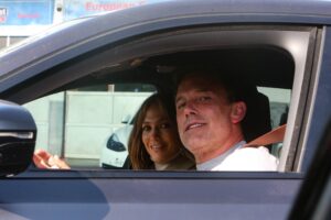 Despite the recent divorce rumors, couple Ben Affleck and Jennifer Lopez are all smiles as they are spotted together inside his car