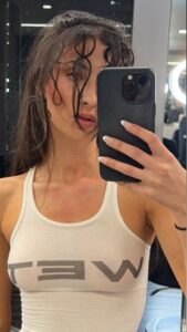 Angelina Censori wore a see-through Yeezy tank top that said: Wet