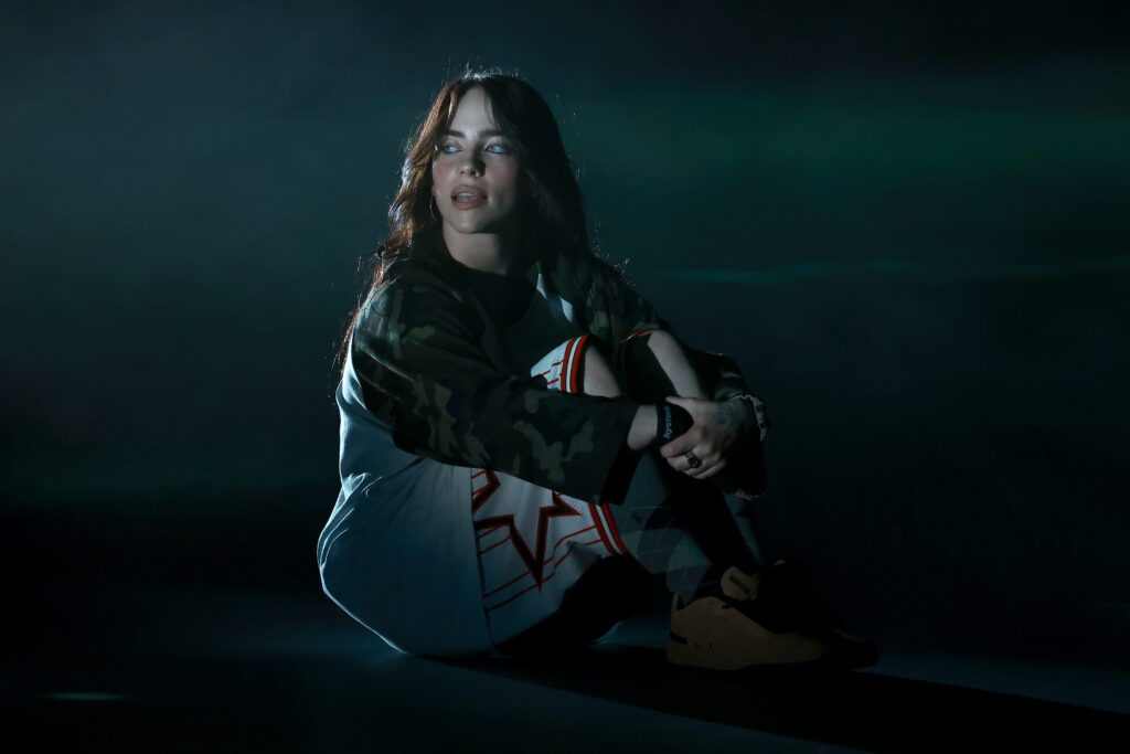 Billie Eilish revealed in a new interview that she was strapped down in the water to capture her album's cover art