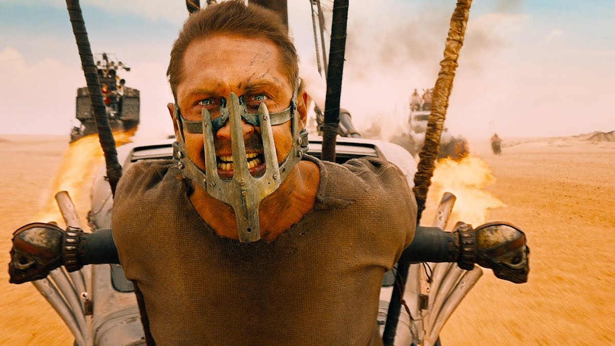 Max (Tom Hardy) strapped to a car in Mad Max: Fury Road.