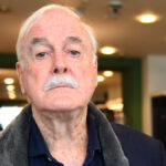 John Cleese Removes Slurs from Fawlty Towers Play, Blames "Literal-Minded"