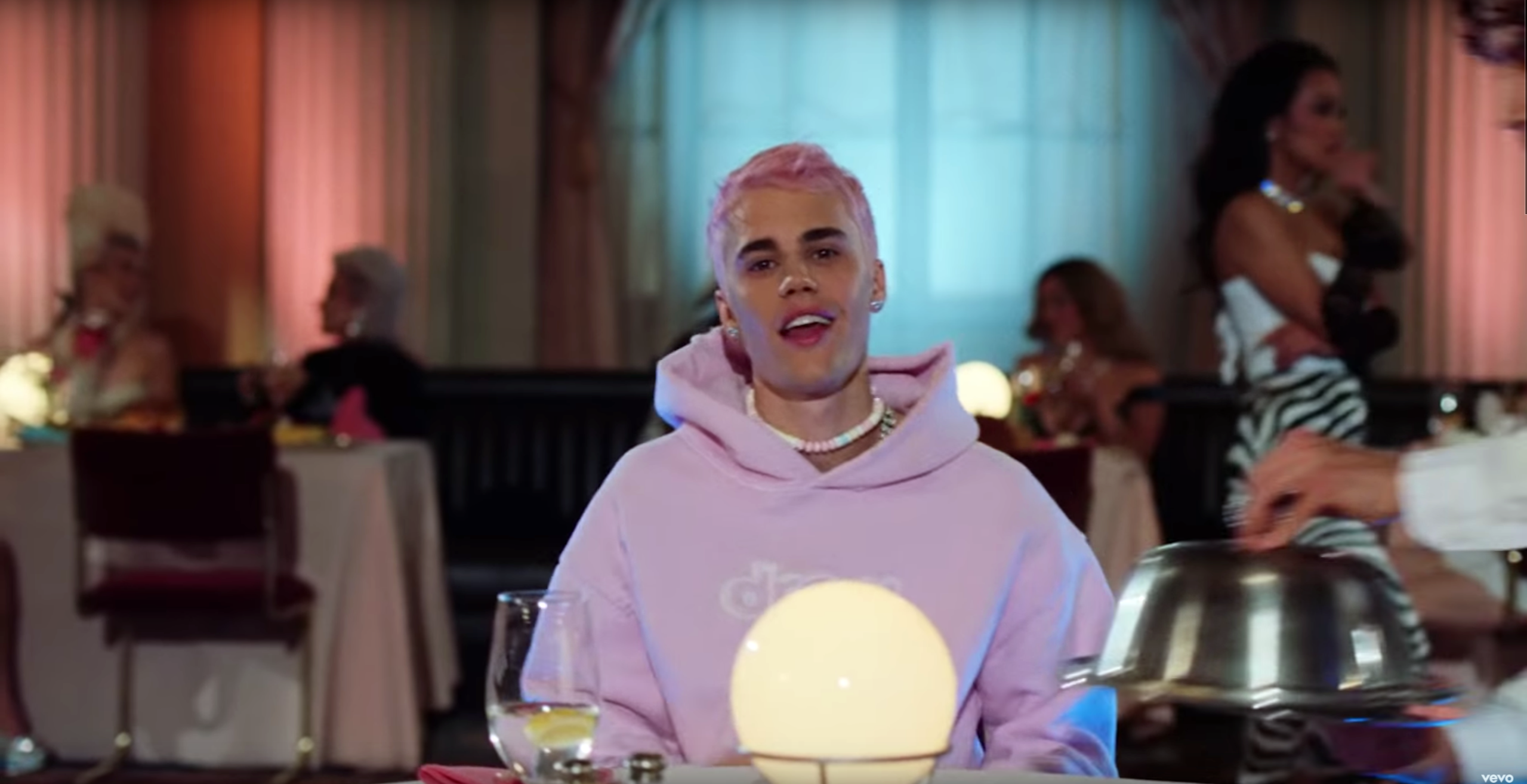 Justin Bieber wore a pink Drew House hoodie in his Yummy music video